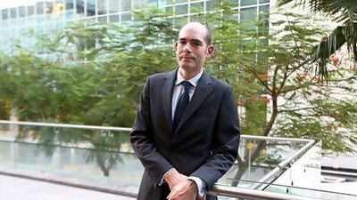 James Bennett says "getting experience abroad is part of the career for financial services professionals." Pawan Singh / The National