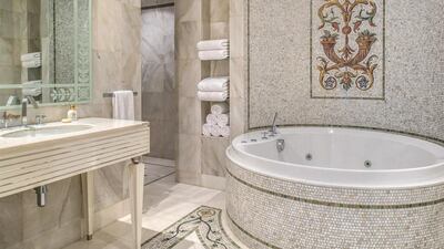 Patterns and designs made famous in the fashion collections on Versace's Runways were used throughout the interiors, including the bathroom. Courtesy Palazzo Versace