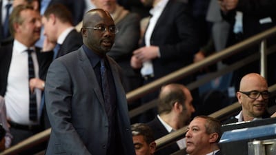 George Weah shown attending the Champions League quarter-final first leg match between Paris Saint-Germain and Barcelona in Paris on Wednesday. Martin Bureau / AFP