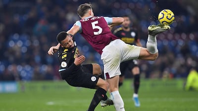 Manchester City's striker Gabriel Jesus (L) vies with Burnley defender James Tarkowski. AFP