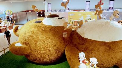 A giant teddy bear is on display at the teddy bear show at the Captain Bear Museum in Taoyuan County, northern Taiwan, September 23, 2014. The bear - 9.1 metres long, three metres wide and three metres high - is one of the largest teddy bears in the world. The permanent teddy bear exhibition, which opened on September 21, featuring hundreds of teddy bears of various sizes made in Taiwan and abroad. EPA
