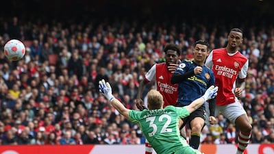 Manchester United's Cristiano Ronaldo scores in the Premier League match againstr Arsenal at the Emirates Stadium in April, 2022. AFP