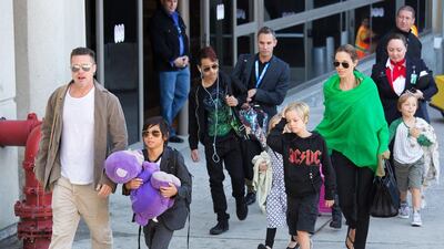 Brad Pitt and Angelina Jolie with five of their six children, from left, Pax, Maddox, Vivienne, Shiloh and Knox in Los Angeles in February last year. GVK / Bauer-Griffin / GC Images