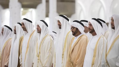 Sheikh Mohammed, fourth right, attends Eid Al Fitr prayers at the Sheikh Zayed Grand Mosque with, right to left, Sheikh Mohamed bin Butti Al Hamed, Sheikh Suroor bin Mohamed Al Nahyan, Sheikh Saif bin Mohamed Al Nahyan, Sheikh Mohamed bin Zayed Al Nahyan, Crown Prince of Abu Dhabi and Deputy Supreme Commander of the UAE Armed Forces, Sheikh Hazza bin Zayed Al Nahyan, Vice Chairman of the Abu Dhabi Executive Council, Sheikh Saeed bin Zayed Al Nahyan, Abu Dhabi Ruler’s Representative, Sheikh Nahyan Bin Zayed Al Nahyan, Chairman of the Board of Trustees of Zayed bin Sultan Al Nahyan Charitable and Humanitarian Foundation, and Lt General Sheikh Saif bin Zayed Al Nahyan, UAE Deputy Prime Minister and Minister of Interior. Ryan Carter / Crown Prince Court - Abu Dhabi