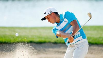 Rickie Fowler plays a bunker shot during a practice round for last year's Abu Dhabi HSBC Championship. Scott Halleran / Getty Images