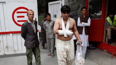 A man injured in a blast leaves a hospital after treatment in Kabul, Afghanistan. REUTERS