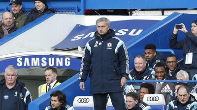 Chelsea manager Jose Mourinho watches his team during their Premier League win over Burnley on Saturday. Lefteris Pitarakis / AP / February 21, 2015