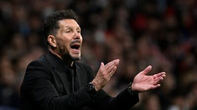 Atletico Madrid coach Diego Simeone claps. AFP