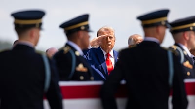 US President Trump saluting during a dignified transfer of the remains of US Army service members killed in the Iran war. EPA
