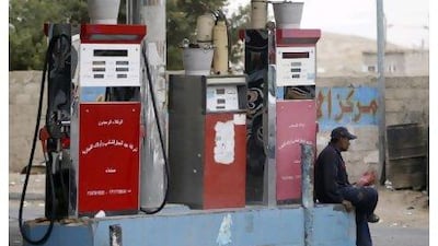 Fuel shortages have caused three-mile-long queues at Yemeni petrol stations. Khaled Abdullah / Reuters