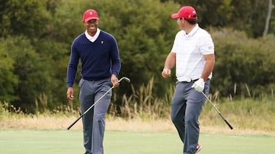 Playing Captain Tiger Woods (L) of the USA team and Patrick Reed. EPA