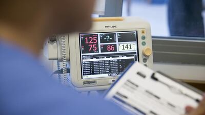 A patient having his blood pressure measured at the emergency department of Burjeel Hospital. Silvia Razgova / The National