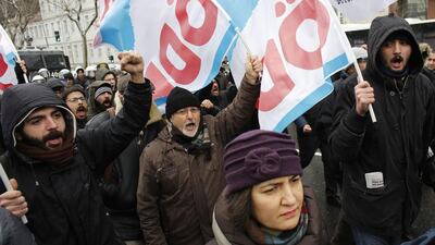 Protesers shout slogans in favour of Greece’s ruling Syriza party during a mass action against the G20 meeting in Istanbul. Murad Sezer / Reuters