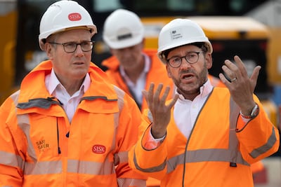 Britain's Prime Minister Keir Starmer, left, visits a construction site in York, northern England on Thursday. AFP