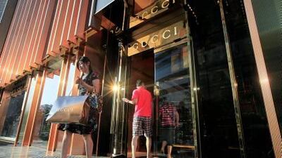 Gucci lowered its prices since the economic downturn to keep its value-conscious wealthy consumers.