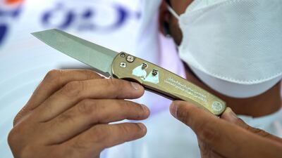 A vendor displays his wares at the Tamreen stall at Adihex. Victor Besa / The National