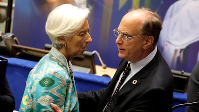 Managing Director and Chairwoman of the International Monetary Fund Christine Lagarde, left, speaks with Larry Fink, the chairman and CEO of BlackRock, an American multinational investment management corporation before the High-level Meeting on Financing the 2030 Agenda for Sustainable Development at United Nations headquarters. EPA