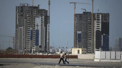 Economic growth in Abu Dhabi, which has the world’s seventh-largest proven oil reserves and 95 per cent of the UAE’s oil, is expected to slow down, the bank said. Silvia Razgova / The National