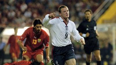 Wayne Rooney, centre, celebrates his first goal for England against Macedonia during their Euro 2004 qualifying match at the City stadium in Skopje, on September 6, 2003. Dimitar Dilkoff / AFP