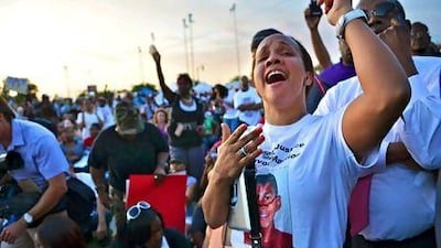 Thousands participate in a rally for Trayvon Martin, the teen shot by a Neighborhood Watch patrol captain, in Sanford, Florida.