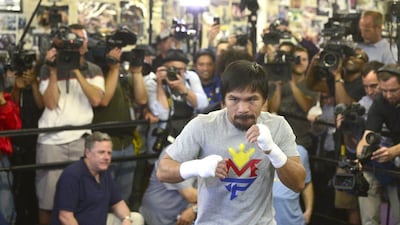 Manny Pacquiao shown working out on Wednesday to prepare for his fight with Floyd Mayweather on May 2. Michael Nelson / EPA