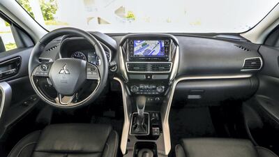 The cabin is slightly blighted by hard plastics and odd faux carbon fibre addenda. Victor Besa / The National