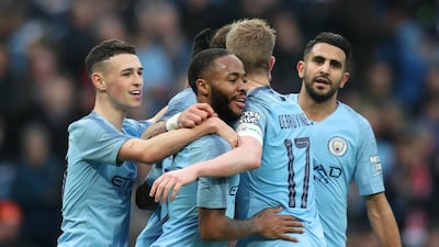 Raheem Sterling, centre, and his Manchester City teammates were far too strong for Rotherham United in the FA Cup. Reuters