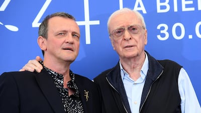 Director David Batty, left, and actor Michael Caine pose for photographers during the photo call of the film'My Generation. AP