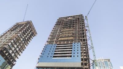 Apartment projects in Dubai are often delayed, but this does not necessarily mean that investors can penalise the developer. Antonie Robertson / The National