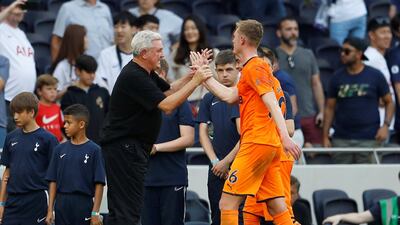 Newcastle United manager Steve Bruce shakes hands with Sean Longstaff after the match. Reuters