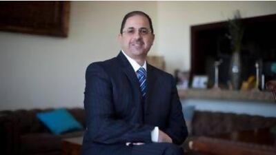 Ahmad Hindawi, a former minister of industry and trade in his native Jordan and currently a Dubai-based consultant, is show at his home in Dubai. Razan Alzayani / The National