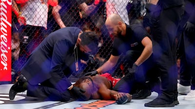 Bobby Green lies on the ground after Paddy Pimblett forced his submission in the first round of their lightweight contest. Reuters