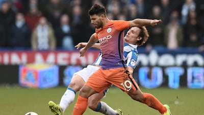 Sergio Aguero was restored to the Manchester City starting line-up byt the Argentine striker could not find a way past the Huddersfield Town defence. Oli Scarff / AFP