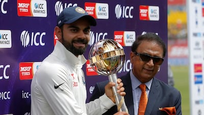 Sunil Gavaskar, right, reckons the absence of Virat Kohli will be a setback for India. Reuters