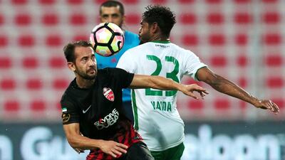 Al Ahli’s Everton Ribeiro, left, battles for the ball against Emirates’ Haidar Alo Ali during their Arabian Gulf League match on Saturday. Christopher Pike / The National