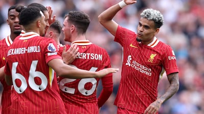 Luis Diaz, right, celebrates with Trent Alexander-Arnold after scoring his and Liverpool 's second goal in their Premier League win over Bournemouth at Anfield. Getty Images