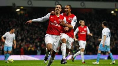 Robin van Persie, the Arsenal captain, left, scored twice and Theo Walcott once in ‘six crazy minutes’ against Aston Villa on Sunday night.