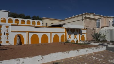 An example of one of the homes originally built in the 1970s in the Shabiyat Al Maqam area in Al Ain next to a modern villa. Delores Johnson / The National