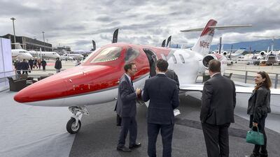 Visitors view Honda Aircraft’s business jet HondaJet, which is making its European debut. HondaJet is in the final phases of certification flight testing in the US, with FAA approval expected in the next few months and first deliveries to follow. Fabrice Coffrini / AFP