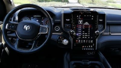 The storage compartment between the front seats is enormous; there are also two glove boxes