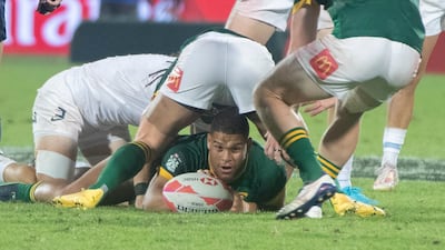 South Africa player gathers the ball.