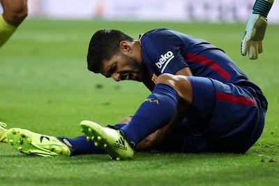 Barcelona's Luis Suarez could be in line for a call-up to Uruguay's staring XI as he continues to recover well from a knee injury. Juan Medina / Reuters