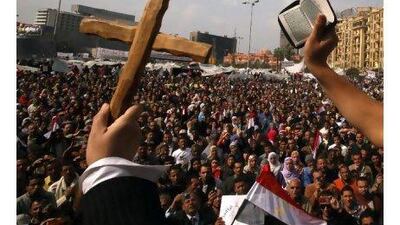 A cross and a Quran are held up during demonstrations earlier this year in Cairo's Tahrir Square. A reader praises the centuries-old ethnic and religious diversity of the Middle East. Schaib Salem / Reuters