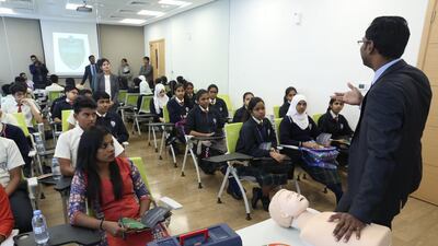 Pupils and teachers at a school learn about emergency situations. Courtesy Aster Hospital