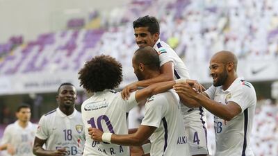 Ibarhim Diaky, second from left, says Al Ain are not celebrating just yet despite being top of the Arabian Gulf League table. Adil Alnaimi / Al Ittihad