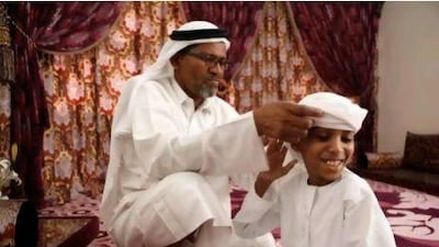 Abdullah Hassan Al Marzouqi, a 13-year-old Emirati boy suffering from sickle cell anemia. His spleen has been removed without incision or cutting by doctors at Al Qasimi Hopsital in Sharjah. He is expected to make full recovery. With him is his farther, Hassan Mohd Hassan Al Marzouqi.