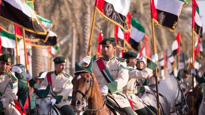 The two-hour parade included marching bands, dancers, giant cartoon characters, stilt walkers and mounted police, and brought the UAE’s rich tapestry to life. Clint McLean for The National