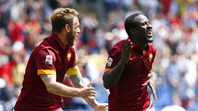 AS Roma's Seydou Doumbia celebrates with teammate Daniele De Rossi after scoring in their Serie A win over Genoa on Sunday. Tony Gentile / Reuters / May 3, 2015