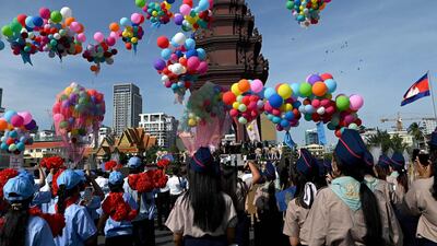 Balloons are released at a ceremony marking Cambodia's 69th Independence Day celebrations in Phnom Penh. AFP
