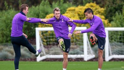 Harry Kane, Christian Eriksen and Erik Lamela of Spurs shown warming up at the team’s training session on Wednesday. Matthew Childs / Action Images / Reuters